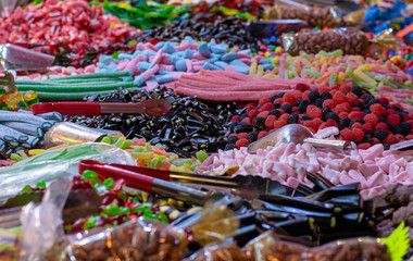 various gelatin sweets of different shapes and colors