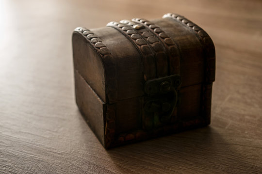 wooden treasure chest on wooden  background