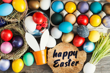 Happy Easter card -Easter  eggs in egg tray, young wheat sprouts from the shell