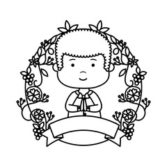 little boy with wreath flowers first communion