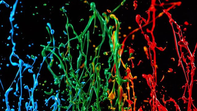 Colorful Splashing Paint in Super Slow Motion. Shot with High Speed Cinema Camera at 1000fps