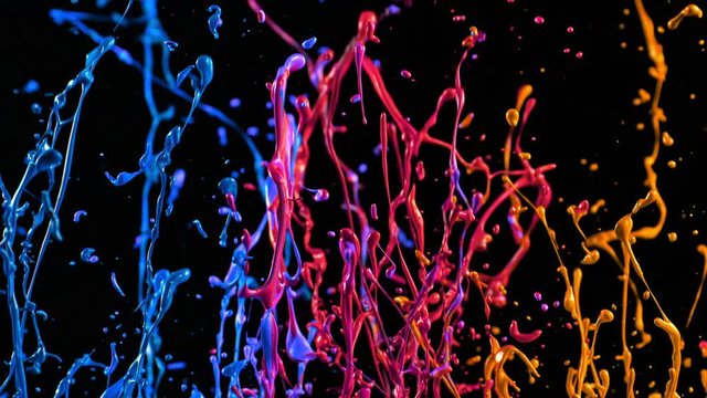 Colorful Splashing Paint in Super Slow Motion. Shot with High Speed Cinema Camera at 1000fps