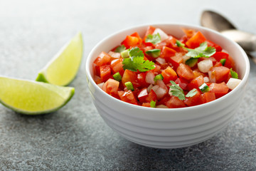 Homemade pico de gallo with tomatoes, peppers, jalapenos and red onions