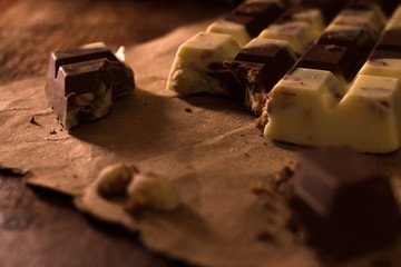 Pieces of black and white chocolate.