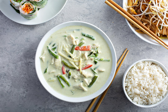 Green Curry With Rice And Other Thai Food On The Table