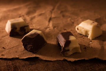 Pieces of black and white chocolate.
