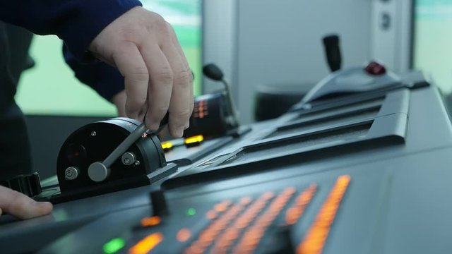 Merchant ship boss uses advanced navigation equipment board in the sea 