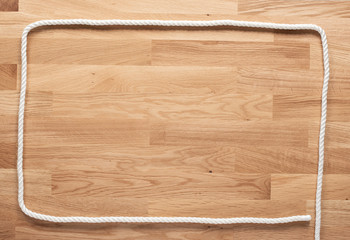 White rope on a wooden table