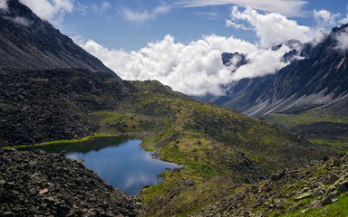 Fototapeta na wymiar Lake in the mountains of the Eastern Sayan