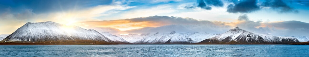 Icelandic winter panorama in Vesturland region with Lambahnukur, Gunnulfsfell, Snjogilskula, Kolgrafamuli mountain peaks behing Kolgrafafjordur fjord - Powered by Adobe