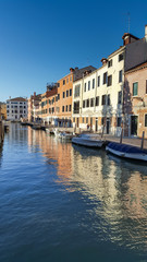 old buildings and boats on canal  in Venice, Italy,2019