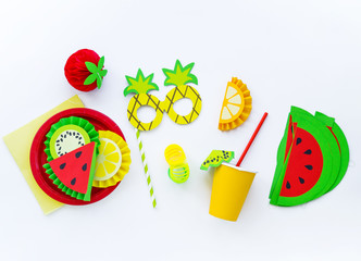 Decor for a holiday of children's birthday. Fruit party. Cake and sweet candy. Flat lay