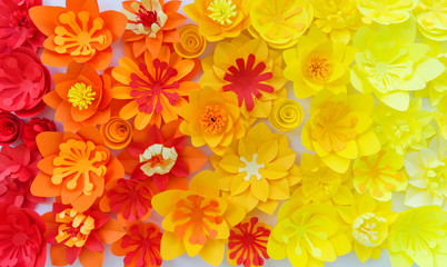 Decorative flowers made from craft paper on white background. Handwork. Spring Holiday Postcard.