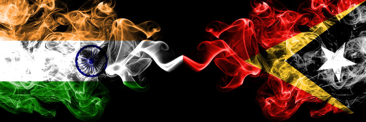 India vs East Timor smoke flags placed side by side. Thick colored silky smoke flags of Indian and East Timor