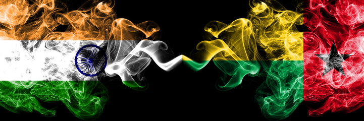 India vs Guinea Bissau smoke flags placed side by side. Thick colored silky smoke flags of Indian and Guinea Bissau