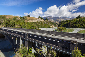 RAKAIA RIVER, CANTERBURY PLAINS/NEW ZEALAND - FEBRUARY 25 : View of the modern bridge over the...
