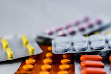 Pills for flu in the package close-up. The concept of treating colds, antidepressants, antibiotics, vitamin pills