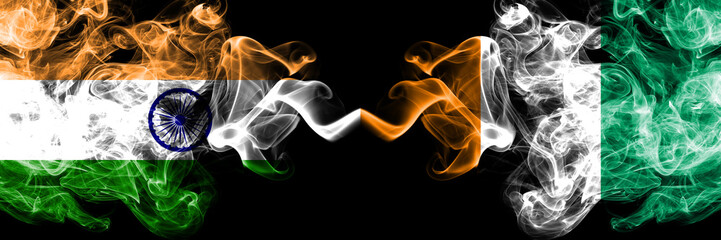 India vs Ivory Coast smoke flags placed side by side. Thick colored silky smoke flags of Indian and Ivory Coast