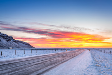 Winter sunrise on Hringvegur in Iceland. Route 1 or the Ring Road or Hringvegur is a national road...