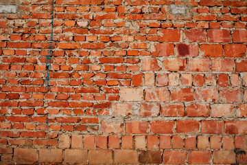 Red brick wall texture background wall made of two kinds of bricks, may use to interior design