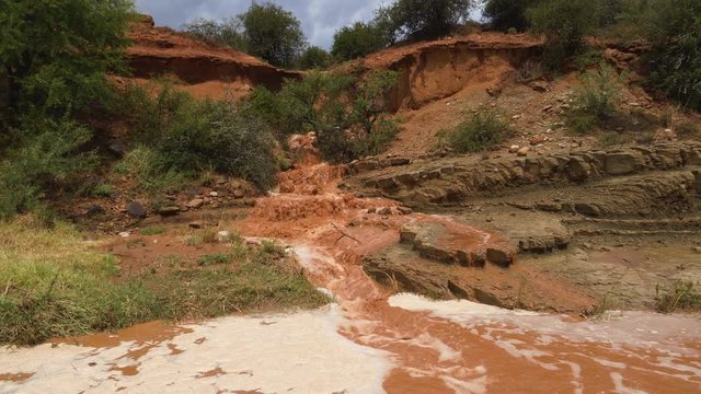 4K view of flooding after heavy rain causes soil erosion