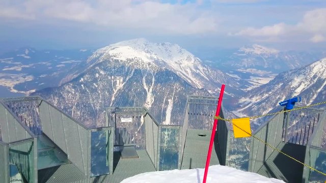 OBERTRAUN, AUSTRIA - FEBRUARY 21, 2019: The breath-catching Five fingers viewing platform of metal and glass on the edge of Krippenstein mount of Dachstein massif, on February 21 in Obertraun