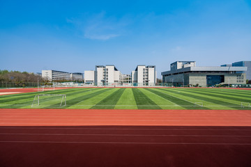 Red running track in stadium