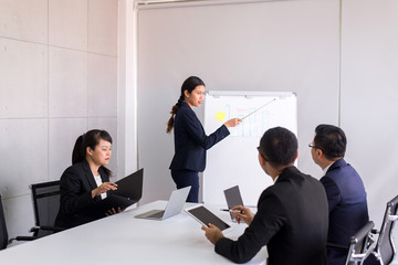 Group of business asian people meeting and working communicating while sitting at room office desk together,Teamwork Concept