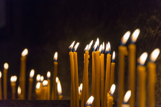 Sevan, Armenia - Jun 07 2018- Candle fire at Sevanavank Monastery. a famous Historic site in Sevan, Gegharkunik, Armenia.