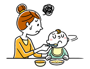 赤ちゃんに食事を与える母親