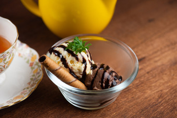 vanilla and chocolate ice cream served with tea