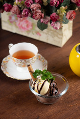vanilla and chocolate ice cream served with tea