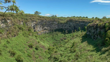 Fototapeta na wymiar wide view of los gemelos sinkhole on santa cruz island, galapagos