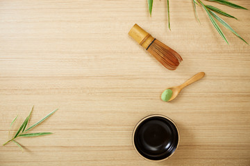 Fototapeta na wymiar Matcha green tea on wood background