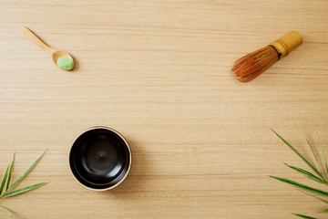 Matcha green tea on wood background