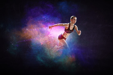 Obraz na płótnie Canvas Fast running young woman. Mixed media