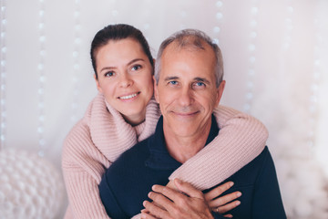 couple in love hugs on white background. man and woman smiling. Valentine's day