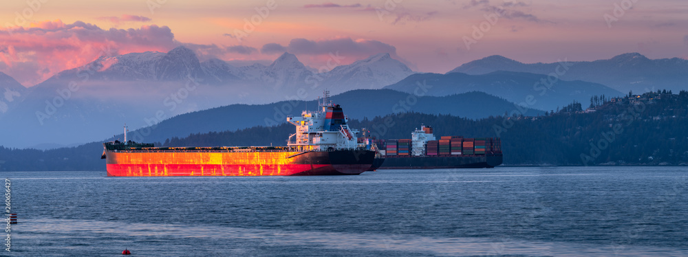 Wall mural freighters stop at sunset