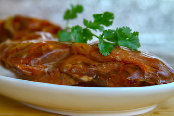 Chinese food beef skew with tendon in a white plate