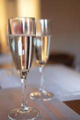 Photo of two glasses of champagne. Festive alcoholic drink.