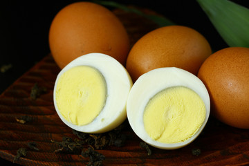 Peeled sliced boiled egg and whole egg