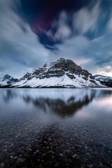 Fototapeta na wymiar Lake reflection of mountain during sunset