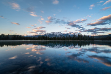 Sunrise reflection of mountain on lake