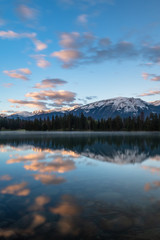 Sunrise mountain reflection in lake