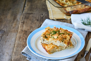 Cauliflower casserole with cheese and fresh herbs 