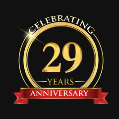 Celebrating 29 years anniversary logo. with golden ring and red ribbon.