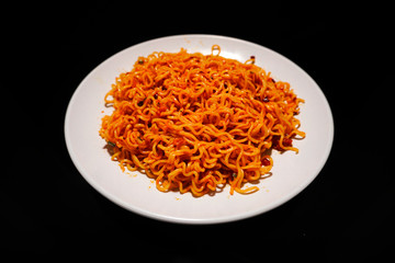 Spicy noodle on white plate 