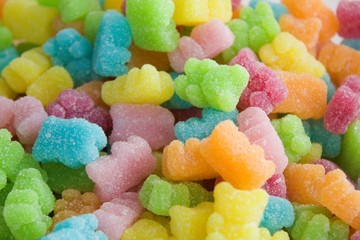 Many multicolored jelly gummy bears.Yellow, orange, red, pink, blue and green jelly bears on a...