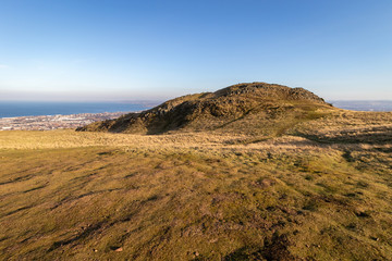 EDINBURGH, SCOTLAND, 20 February 2019, Cityscape of Edinburgh from Arthur's seat in beautiful February sunny day. Edinburgh, the most popular tourist city destination in Scotland