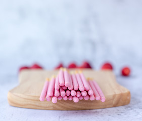 Japanese snack biscuit stick strawberry coated white background.